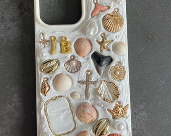 Customizable Memor Inspired Handmade iPhone Case. Personalized w/ hand-picked seashells, shark teeth, sea glass, and charms from FL beaches.