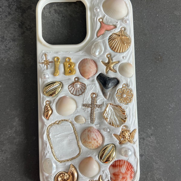 Customizable Memor Inspired Handmade iPhone Case. Personalized w/ hand-picked seashells, shark teeth, sea glass, and charms from FL beaches.