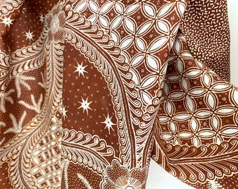 Extremely fine hand-drawn batik on a silk shawl.