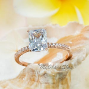 14K Rose Gold Plated Sterling Silver Radiant Cut CZ Ring For Women.  Flawless Clarity, High Brilliance 9x7mm Clear CZ Diamond Wedding Ring