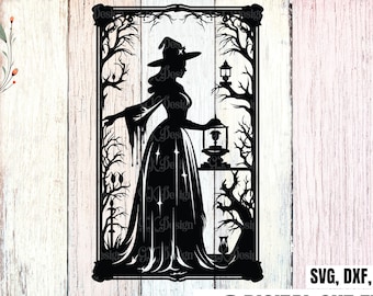 May include: Black silhouette of a witch holding a lantern in a frame with a tree design. The witch is wearing a pointed hat and a long dress. The lantern is lit and has a flame inside. The tree design is intricate and detailed. The image is in a black and white color scheme.