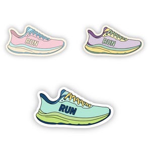 May include: Three colorful running shoe stickers. One is pink with blue accents, another is purple with yellow accents, and the third is teal with yellow accents. Each shoe has the word "RUN" printed on the side.