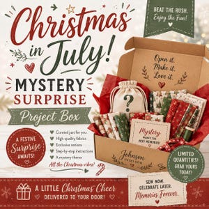 May include: A cardboard project box labeled Johnson Heirloom containing folded fabric pieces in red and green patterns, a small beige drawstring bag with a question mark, and a card reading Mystery MAKES THE BEST MEMORIES! The box interior says Open it. Make it. Love it.