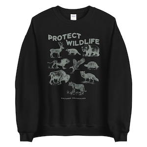 May include: Black sweatshirt with the text "PROTECT WILDLIFE" above illustrations of various animals, including a deer, bear, and tiger. The words "CULTURED COLLECTIVES" are printed below the animals.
