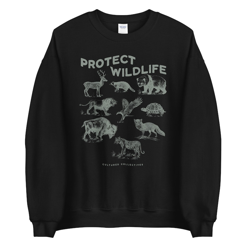 May include: Black sweatshirt with the text "PROTECT WILDLIFE" above illustrations of various animals, including a deer, bear, and tiger. The words "CULTURED COLLECTIVES" are printed below the animals.