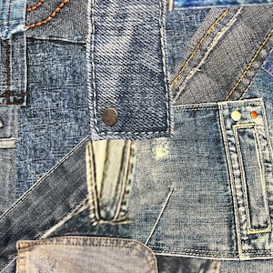 May include: A patchwork design featuring various denim fabric pieces in shades of blue. The design includes visible stitching, rivets, and pocket details, creating a textured and layered effect. The overall theme is a denim textile.