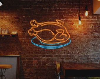 Letrero de neón de pollo frito en un plato para restaurante o cafetería. Pollo asado LED.