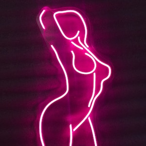 Sexy Girls neon sign for beauty salon or strip club. Sexy body sign, sexy woman, bar wall decor.