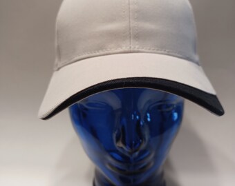 Blank Stone color cap with black "swish" on visor with black sandwich and button details. Stunning