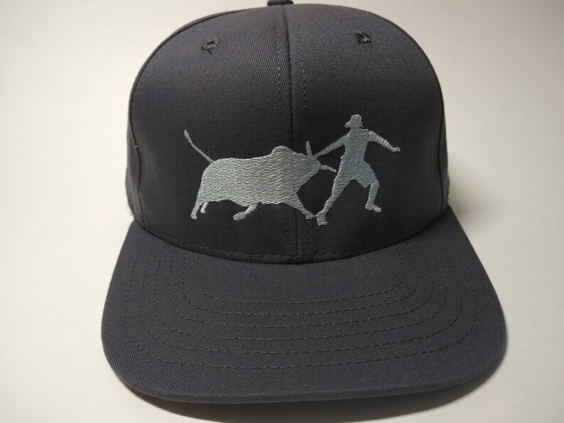 Bull Fighter Silhouette on Charcoal cap with full back flat visor