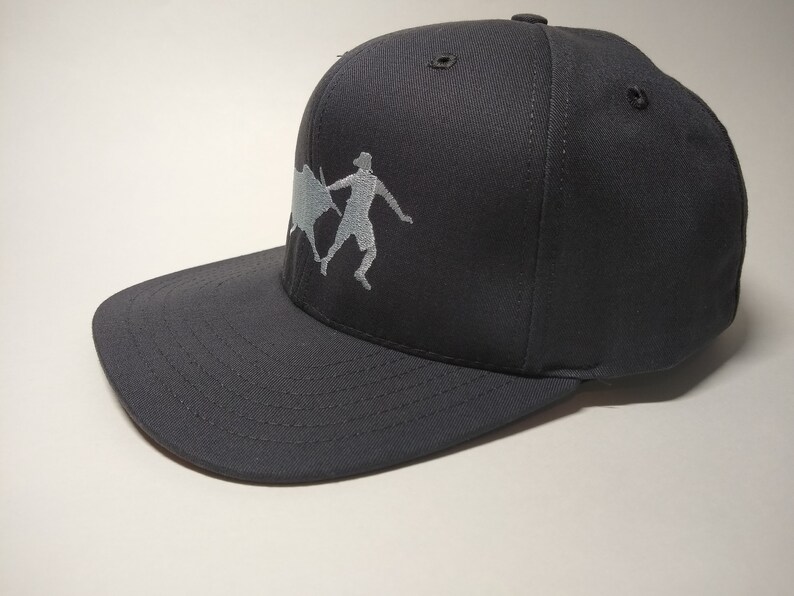 Bull Fighter Silhouette on Charcoal cap with full back flat visor