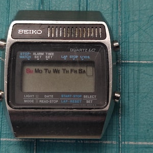 Seiko A159-5019G  Quarts LCD Alarm Stopwatch / LCD partially working / Parts ONLY