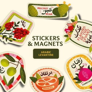 May include: A collection of stickers and magnets featuring illustrations of fruits and text in English and Arabic. Designs include prickly pear, pomegranate, and oranges. The text "STICKERS & MAGNETS" and "ARABIC LEVANTINE" are also visible.
