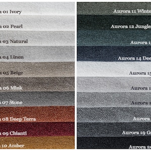 May include: A color chart featuring twenty fabric swatches in various shades. The swatches are labeled with names like "Ivory," "Pearl," "Natural," and "Deep Blue." The color palette ranges from light neutrals to deep, saturated hues, suitable for upholstery or home decor.