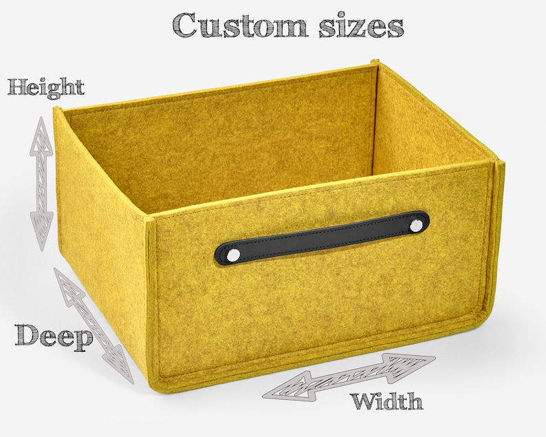 May include: A yellow felt storage box with a black leather handle. The box is labeled with the words "Height", "Deep", and "Width" to indicate the dimensions.