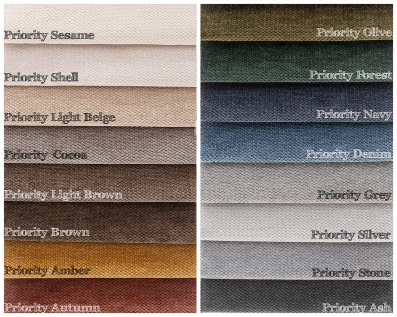 May include: A collection of fabric swatches in various colors, including beige, brown, green, and blue. Each swatch is labeled with a color name, such as "Sesame," "Olive," and "Navy." The fabrics have a textured appearance.