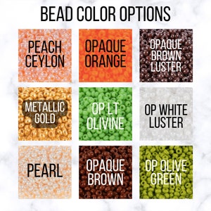 May include: A selection of bead colors for jewelry making. The colors include peach ceylon, opaque orange, opaque brown luster, metallic gold, light olive, white luster, pearl, opaque brown, and olive green.