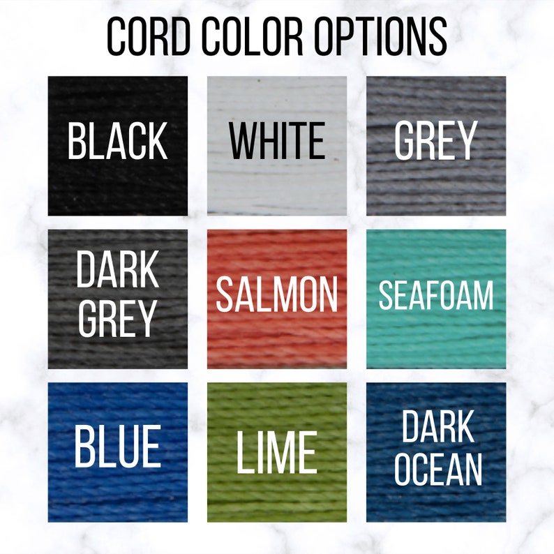 May include: Cord color options for a product. The colors are black, white, grey, dark grey, salmon, seafoam, blue, lime, and dark ocean.