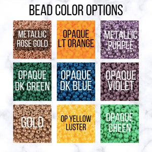 May include: A selection of 10 different colors of seed beads, including metallic rose gold, opaque light orange, metallic purple, opaque dark green, opaque dark blue, opaque violet, gold, opaque yellow luster, and opaque green.