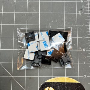 Wreath sign adhesive mounts