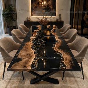 May include: A rectangular dining table featuring a live edge wood slab with a central river of black resin embedded with smooth river stones. The table is supported by a black metal X-shaped base and is surrounded by six beige upholstered chairs.
