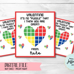 May include: Three printable Valentine's Day cards with a red, yellow, blue, and green block pattern heart. The text on the cards reads "It's no "puzzle" that I think you are great!" and "From: Nate".