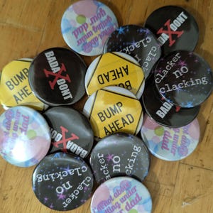 Custom pin back buttons
