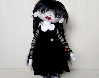 Cloth doll Wednesday in a black dress with black pigtails, rag doll Wednesday skeleton