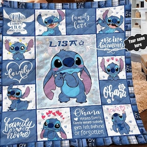 May include: A blue and white quilt with a patchwork design featuring Stitch characters from the Disney movie Lilo & Stitch. The quilt has various phrases including "Ohana means family", "Family means love", "Be in harmony", and "Family home".