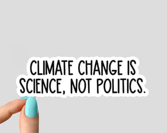 May include: White sticker with black text that reads "Climate Change is Science, Not Politics."