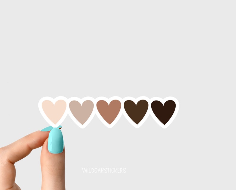 May include: Five heart-shaped stickers in a row, with a white outline. The hearts are different shades of brown, ranging from light to dark.