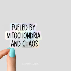 May include: A holographic sticker with the text "Fueled by Mitochondria and Chaos".