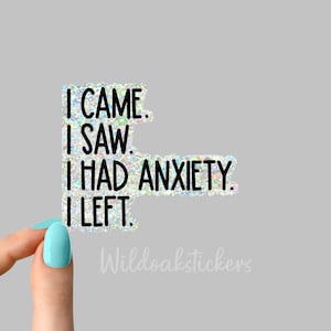 May include: A silver glitter sticker with the text "I came. I saw. I had anxiety. I left."