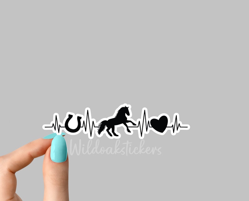 May include: Black and white silhouette of a horse, horseshoe, and heart with a heartbeat line. The text "Wildoakstickers" is below the image.