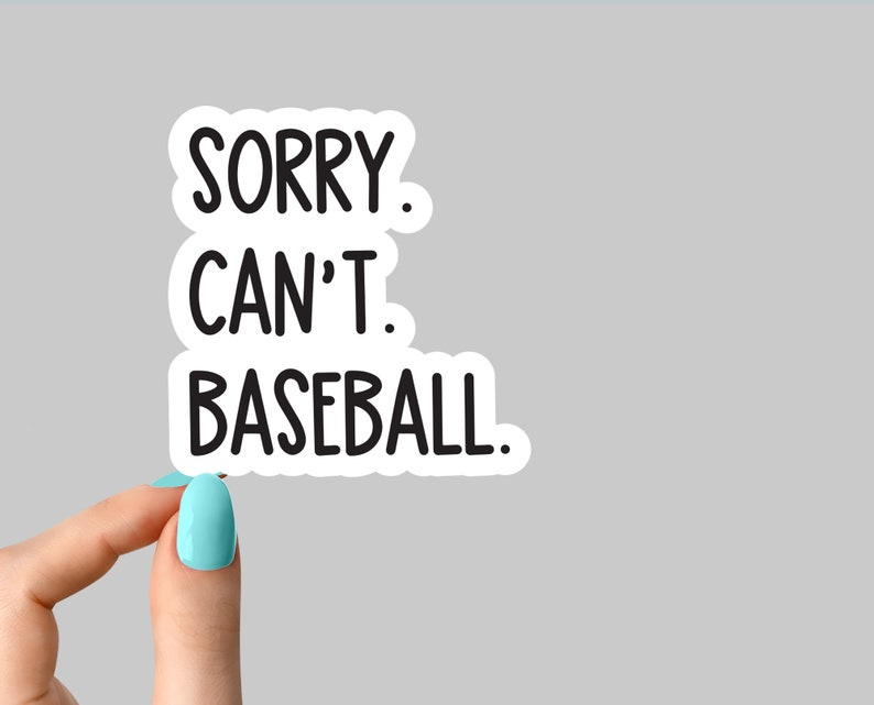 May include: White sticker with black text that reads "Sorry. Can't. Baseball."