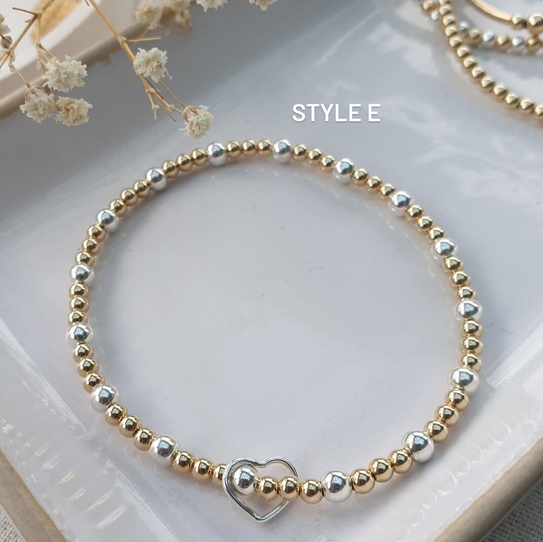 ★送料・関税込★SPORTY&RICH★WELLNESS BEADS BRACELET★ Amazon.com: Tennis Racket Charm Gold Bead Layered Bracelets