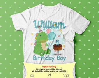 May include: A white t-shirt featuring a green dinosaur holding a cake with the number 5 on top. The shirt also has the name "William" and the text "Birthday Boy" on it.