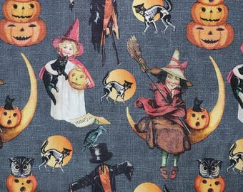 Halloween vintage. Tela de algodón. Niños, calabazas apiladas, búhos, gatos negros, brujas y lunas sobre gris oscuro. Por media yarda, 45 x 109 cm de ancho.