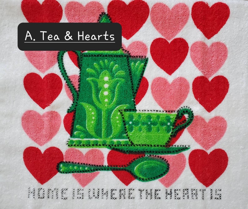 May include: A green teapot and cup with a floral design on a white background with red and pink hearts. The text "A. Tea & Hearts" is at the top of the image. The text "Home is where the heart is" is at the bottom of the image.
