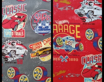 Hot Wheels Classic Cars, Cotton Fabric by Riley Blake. Logos, Wheels, and Cars on Red or Gray. By the Half Yard, 18" long x 43" wide.