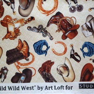 May include: A beige fabric with a repeating pattern of cowboy boots, hats, saddles, horseshoes, and bandanas. The fabric has the text "Wild Wild West" by Art Loft for Studio E Fabrics.
