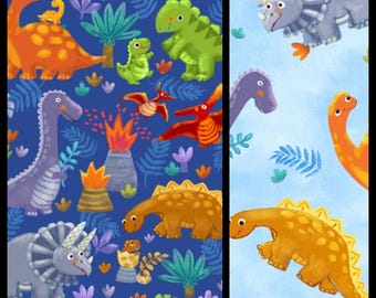 Happy Dinos. Cotton Fabric Panel or Coordinating Print on Blue. Panel Measures 36" x 43". Coordinating Print By The Half Yard, 18" x 43"