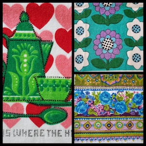 May include: Three different kitchen towels with colourful patterns. The first towel has a green teapot and cup design with red hearts on a white background. The second towel has a green, purple, and white floral design on a turquoise background. The third towel has a floral design with pink, blue, and green flowers on a white background.