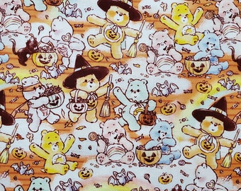 Trick or Treat Rainbows. Halloween Care Bear Fabric, 100% Cotton. Watercolor Bears on Orange Tie Dye. By the Half Yard, 18" x 43" wide.