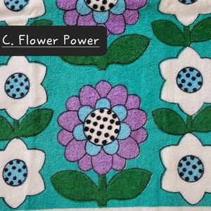 May include: A turquoise background with white, purple and blue flowers with black polka dots. The text "C. Flower Power" is at the top of the image.