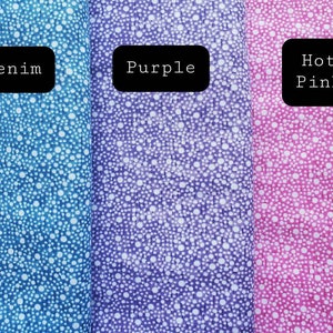 May include: Three fabric swatches with white polka dots on a blue, purple, and pink background. The swatches are labeled "Denim", "Purple", and "Hot Pink".