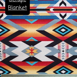 May include: A colorful fabric with a geometric pattern in shades of red, orange, yellow, blue, black, and white. The fabric is labeled "Serape Blanket". A ruler is included for scale.