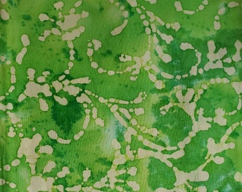 Batik Abstract Cotton Fabric, Beige Pebbles on Lime Green Tie Dye Background. By the Half Yard. 18" long x 44" wide.