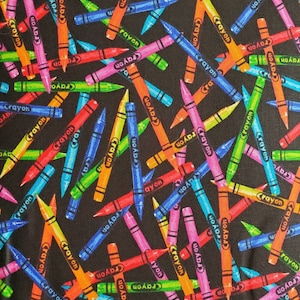 Crayons, ABC-C1488 Cotton Fabric. Bright, Multi-Colored Crayons on Black. By the Half Yard, 18" long x 43" wide.