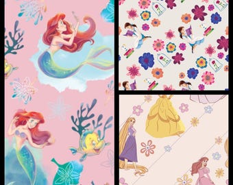 Princesses. Cotton Fabric. Choose from 3 Options: Belle Alone, Arial Alone, or Belle with Arial and Rapunzel. By the Half Yard, 18" x 43".